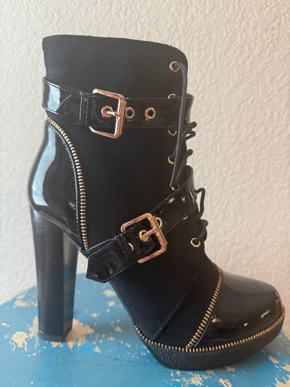 New Italina Patent leather and faux suede boots with zippers and buckles.
